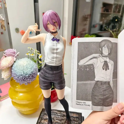 Chainsaw man reze pvc statue display piece with purple hair in white blouse and black shorts on textured base