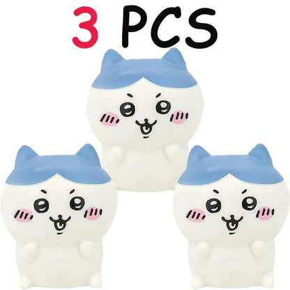 Three cute white and blue cat-shaped squishy toys with pink cheeks in chiikawa hachiware usagi led night light bedroom decor