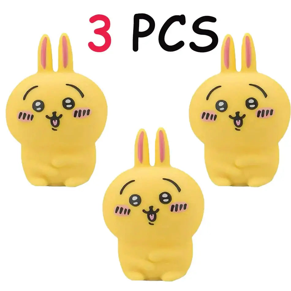 Three yellow rubber bunny erasers with pink ears featuring cute faces for chiikawa hachiware usagi led night light bedroom decor