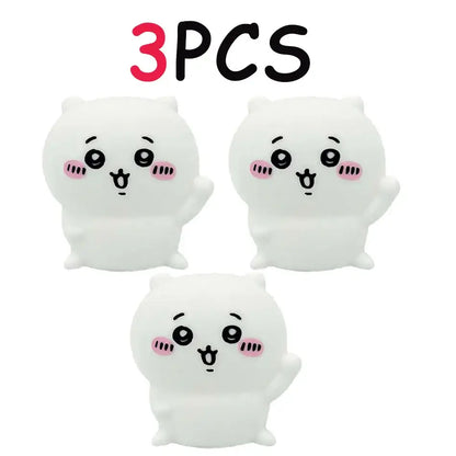Three white plush cat-shaped squishy toys with pink cheeks as chiikawa hachiware usagi led night light decor
