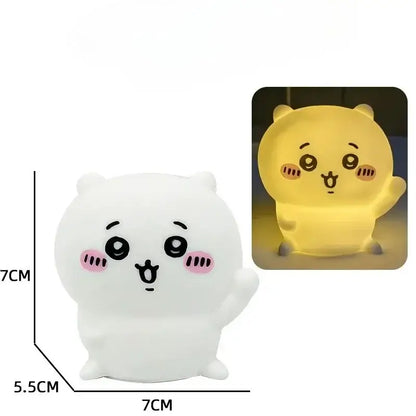 Chiikawa hachiware usagi led night light shaped like a white plush bear with pink cheeks glowing warm yellow