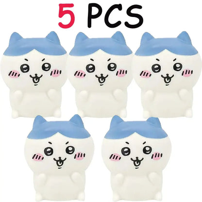 Five white and blue chiikawa hachiware usagi vinyl night light squishy toys with pink cheeks and black eyes
