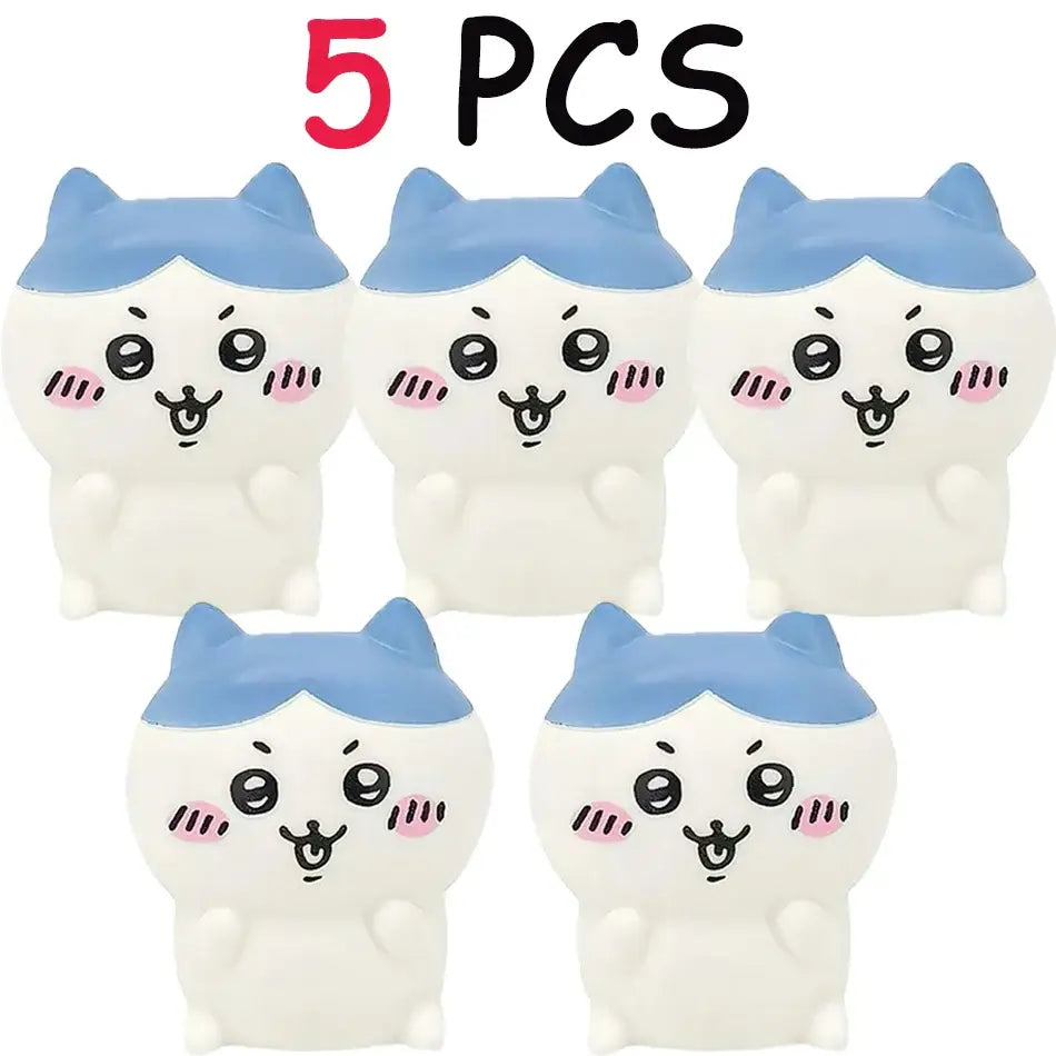 Five white and blue cat-shaped vinyl doll squishy toys with pink cheeks and black eyes for night light use