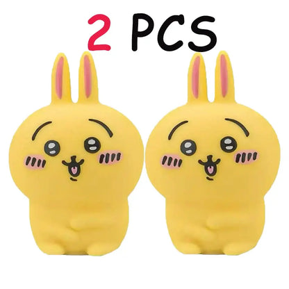 Two yellow plush vinyl doll night lights shaped like chiikawa hachiware usagi rabbits with pink ears and blush marks