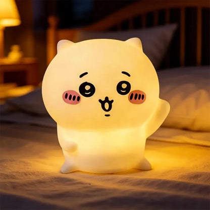 Soft glowing white chiikawa hachiware usagi vinyl doll night light with black eyes and pink cheeks luminous design