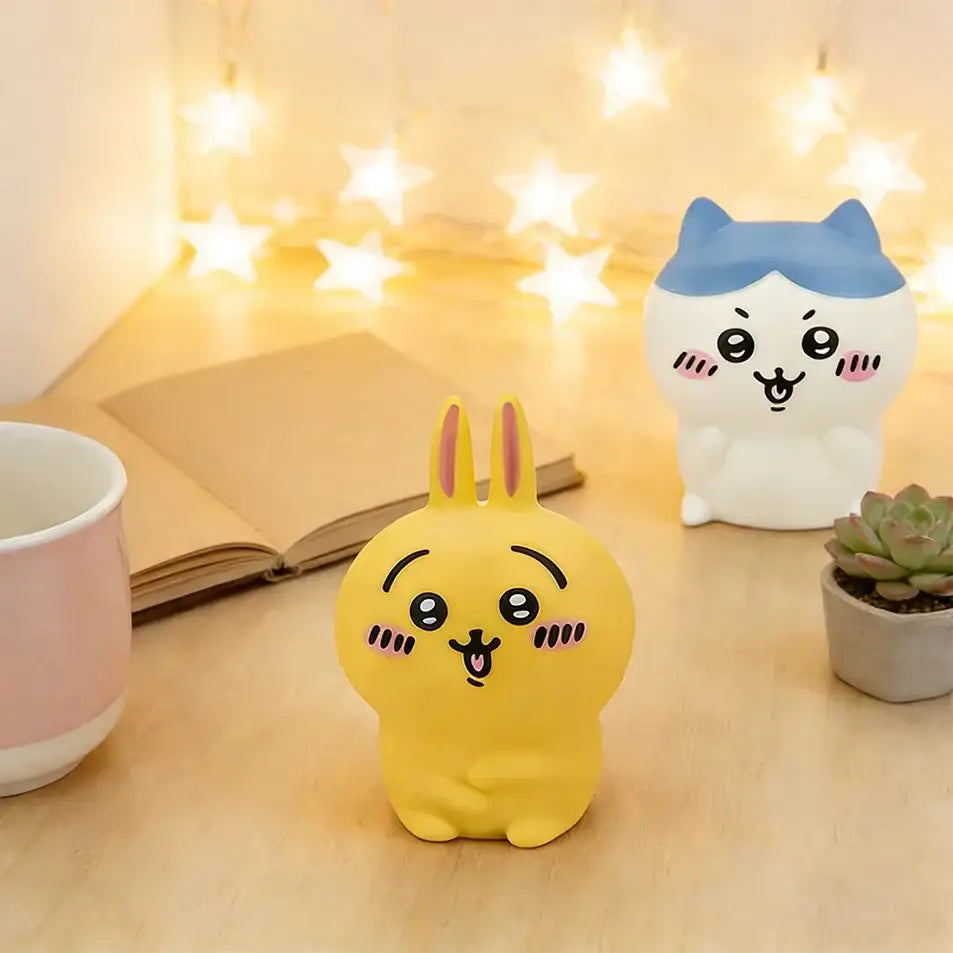 Yellow chiikawa hachiware usagi vinyl doll stress ball with pink ears and blush marks night light luminous