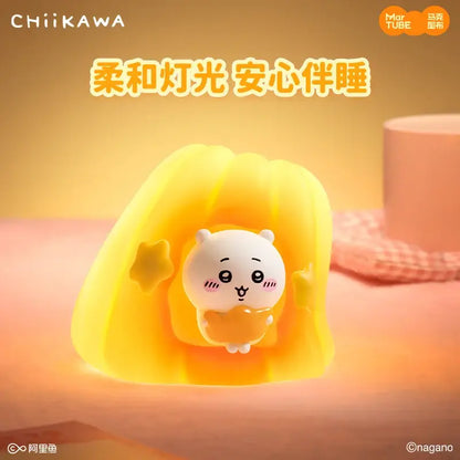 A soft glowing yellow led night light plush lamp featuring a cute white chiikawa character inside its warm light
