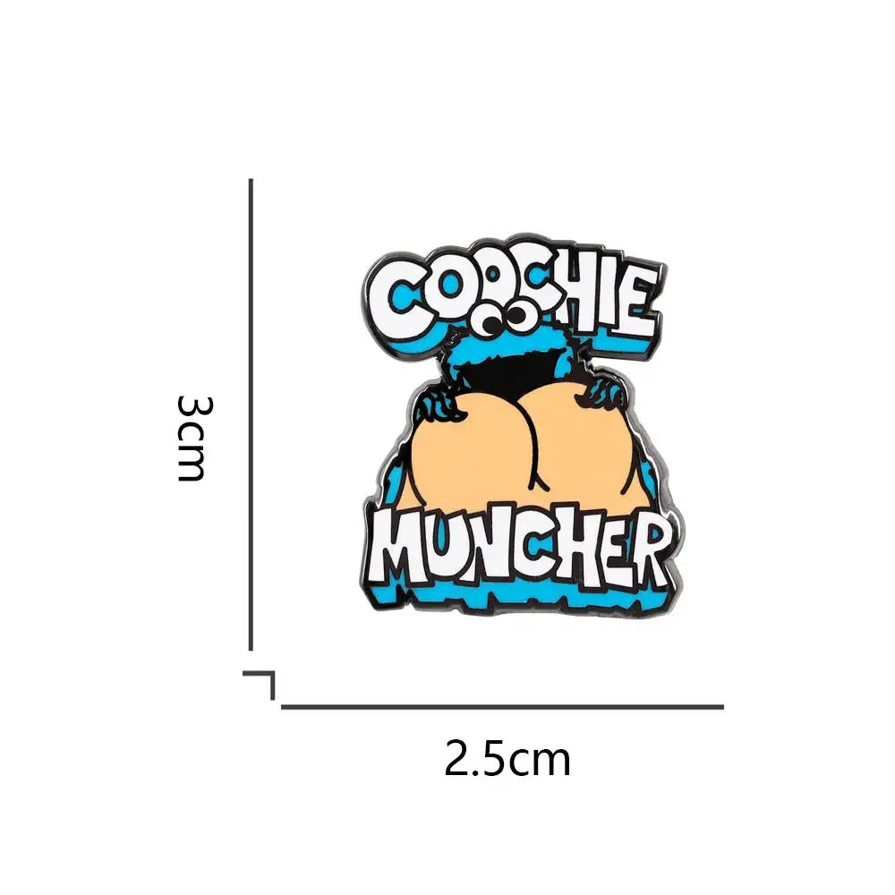 Blue and black cookie monster enamel pin cartoon brooch featuring a cookie monster holding cookies with text cochie muncher