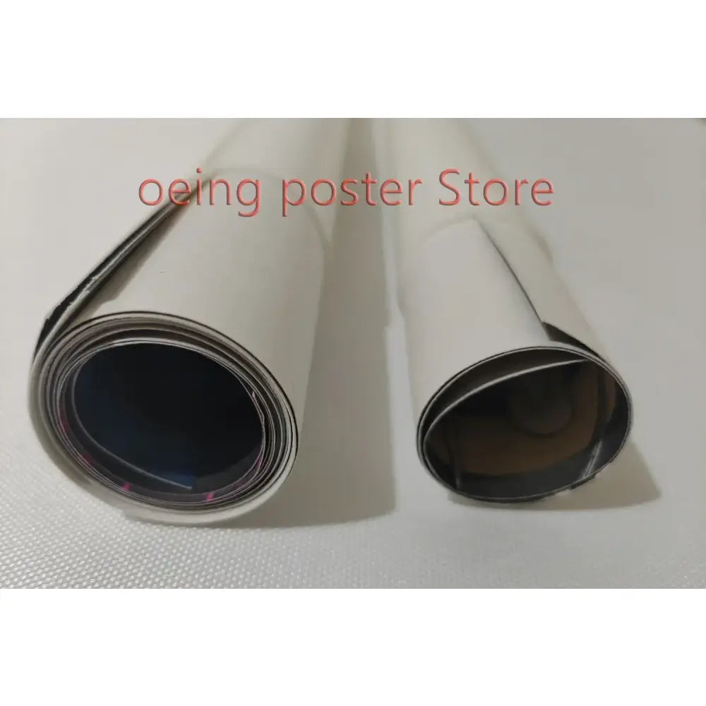 Two rolled-up white matte art paper prints with black inner lining for custom anime game poster use