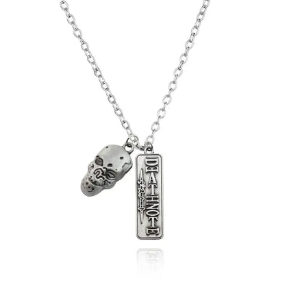 Silver-toned misa amane halberd pendant necklace featuring a detailed skull charm and engraved death note pendant