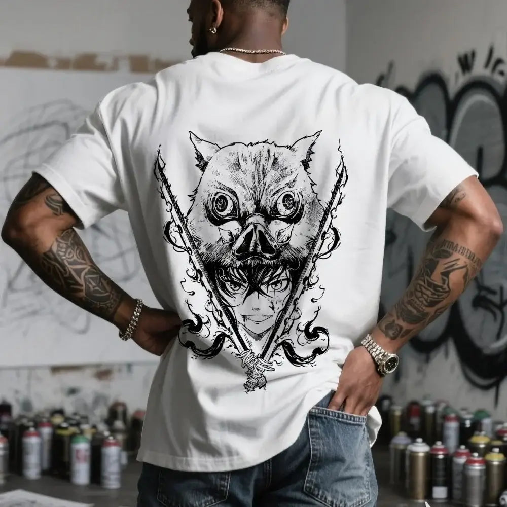 White t-shirt featuring a black ink demon slayer inosuke anime creature with sharp teeth and crossed swords graphic