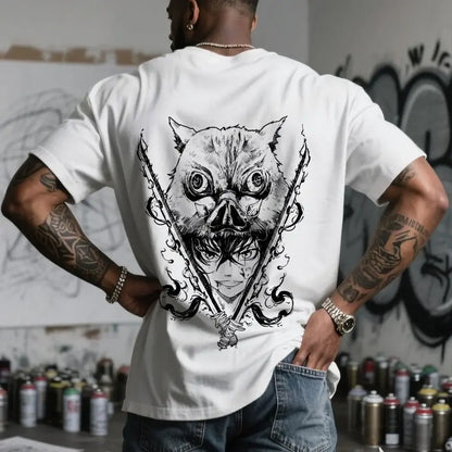 White t-shirt featuring a black ink demon slayer inosuke anime creature with sharp teeth and crossed swords graphic