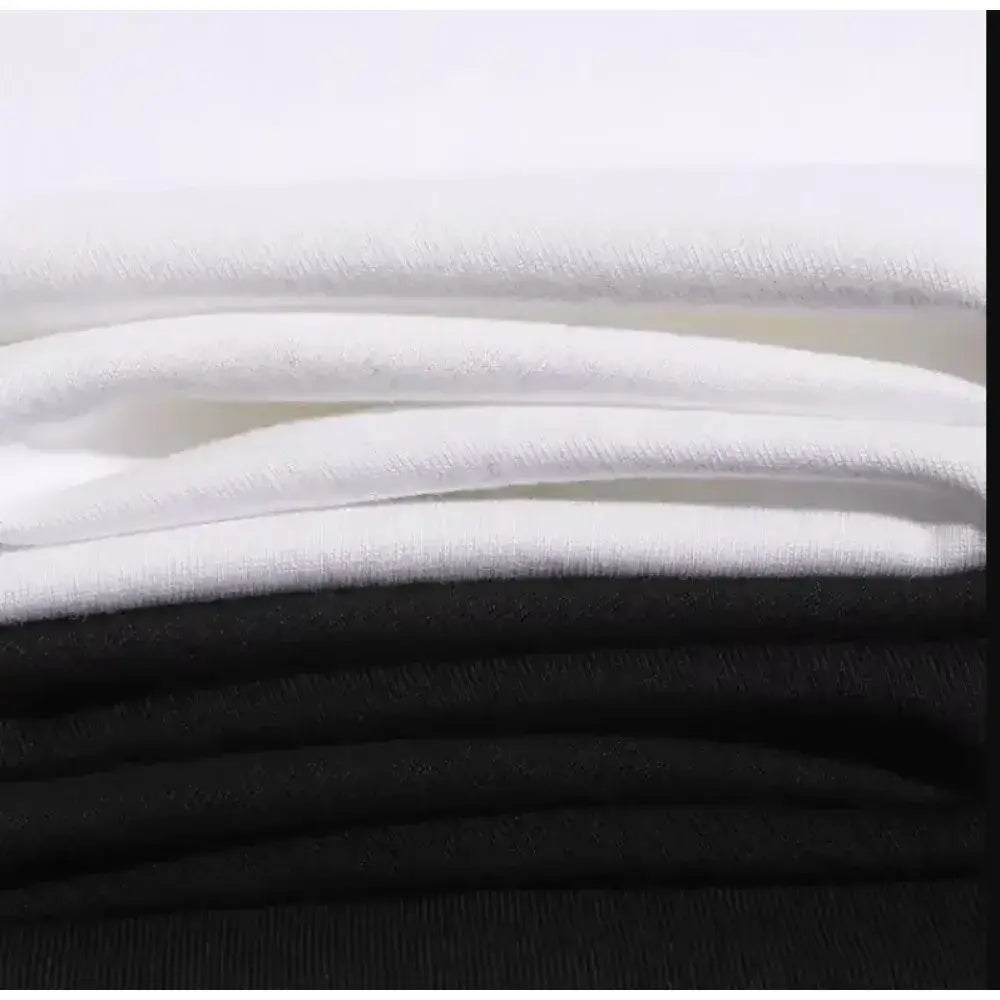 Stacked white and black short sleeve cotton t-shirts featuring demon slayer kamado tanjiro design