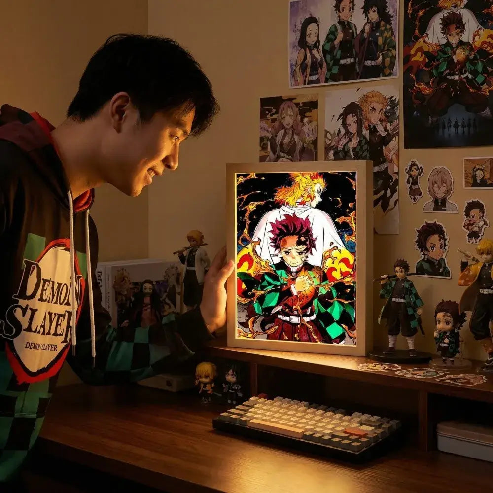 Demon slayer kyojuro rengoku led photo frame with vibrant red and green anime art and glowing orange flames night light
