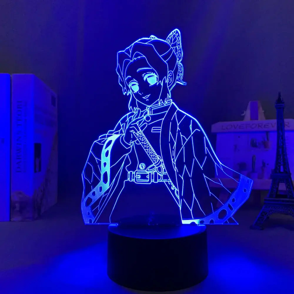 Blue-lit demon slayer nezuko 3d led night light with detailed anime character and intricate outfit design