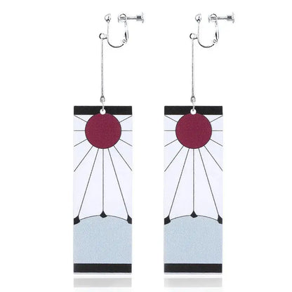 A pair of silver-tone acrylic demon slayer tanjiro butterfly drop clip-on earrings with maroon circle and black lines