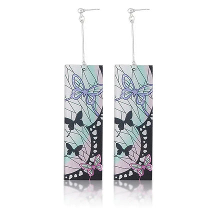 Demon slayer tanjiro acrylic butterfly drop earrings with black purple and pink butterflies on translucent gradient background
