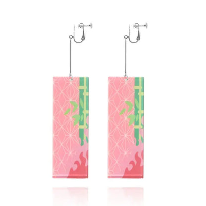 Pink acrylic butterfly drop earrings featuring demon slayer tanjiro green bamboo and geometric patterns with silver clips