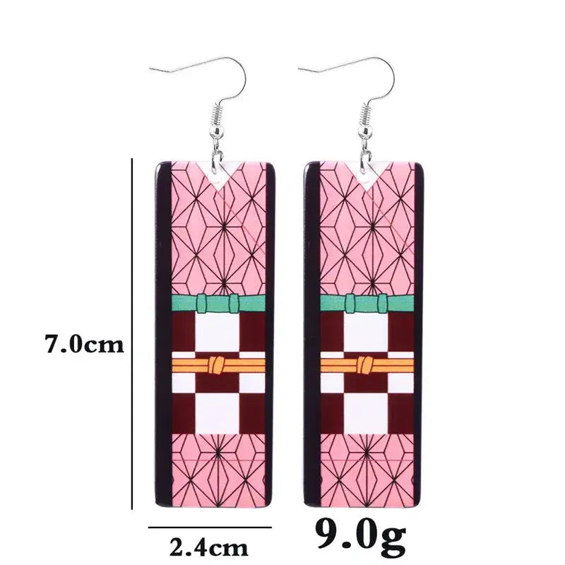 Pair of rectangular acrylic butterfly drop earrings with pink maroon geometric design and silver hooks inspired by demon slayer tanjiro