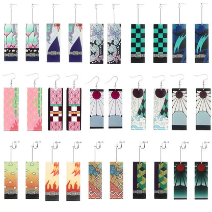 Rectangular acrylic butterfly drop earrings featuring vibrant demon slayer tanjiro inspired designs on a glossy surface