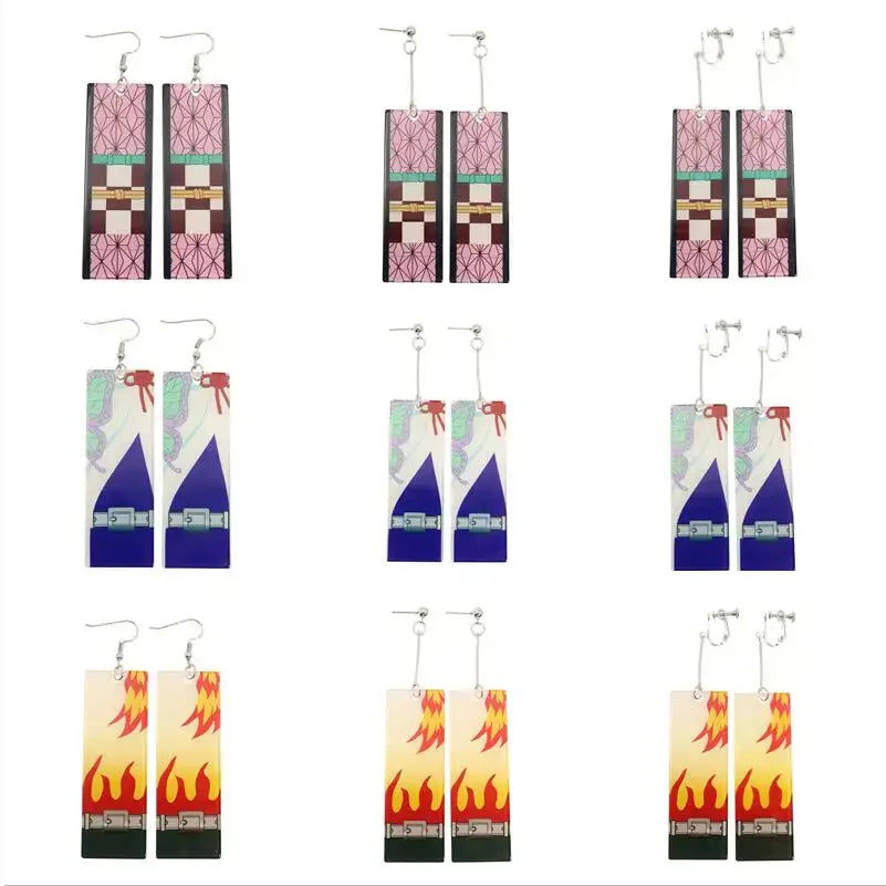 Rectangular acrylic demon slayer long drop earrings with vibrant pink blue orange geometric flame designs and metallic accents