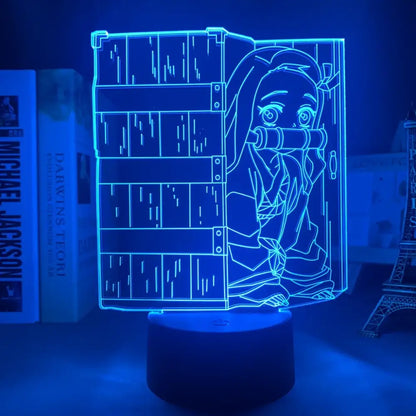 Blue glowing 3d led night light featuring demon slayer tanjiro kamado anime character peeking behind wooden crate for demon slayer fans
