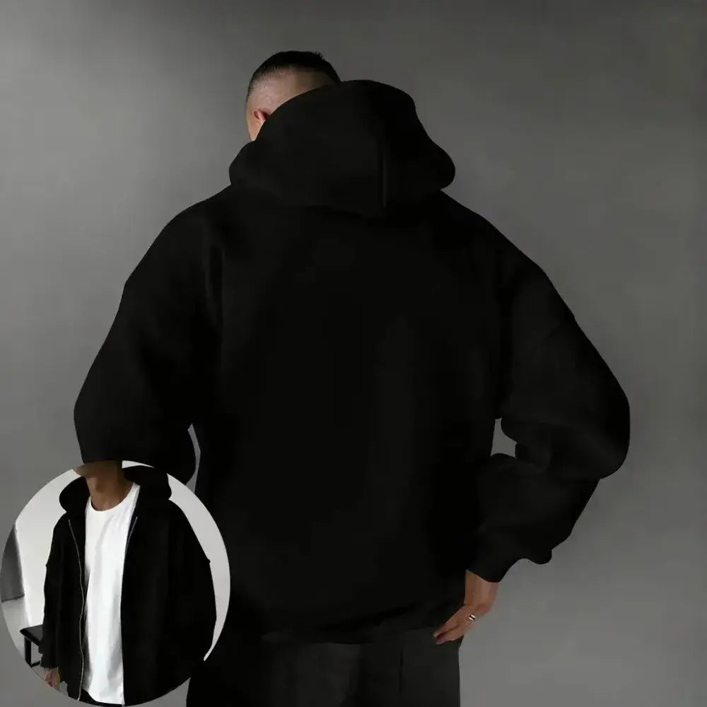 Black oversized demon slayer hooded jacket with relaxed fit ribbed cuffs and graphic print inspired by tanjiro kamado