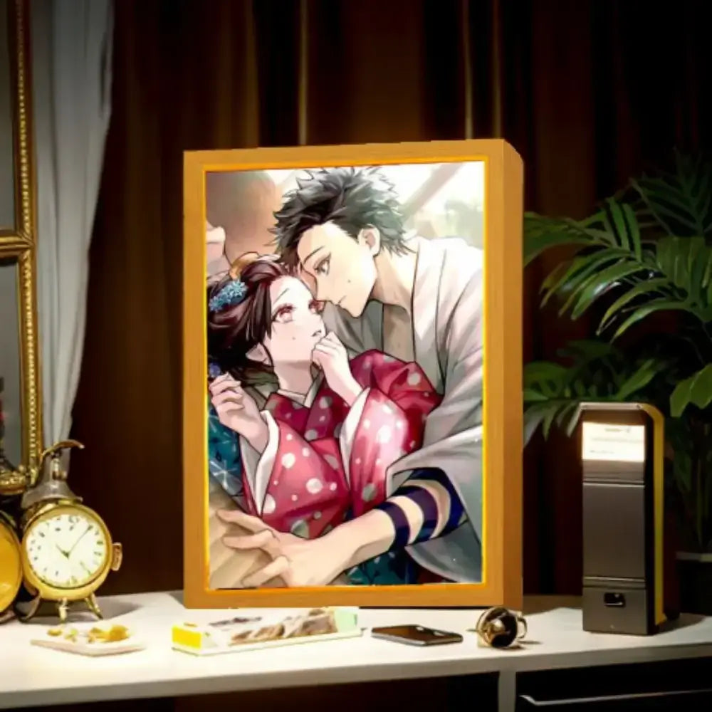 Golden-framed demon slayer tanjiro anime decor led light frame featuring a romantic scene with traditional attire characters