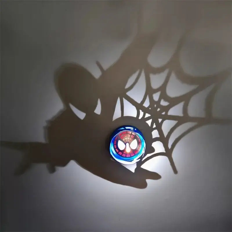 Circular detective conan goku projector lamp night light with glowing red and blue spider-man face design
