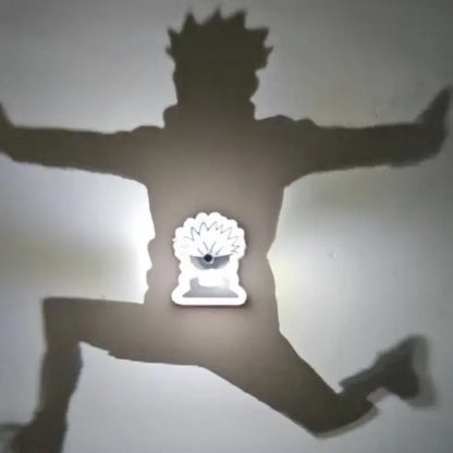 A glowing white led detective conan goku projector lamp shaped like a spiky-haired anime head as a night light