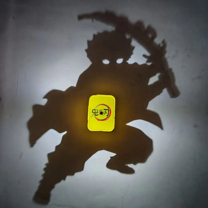 A bright yellow detective conan goku projector lamp night light casting an anime shadow with chinese characters