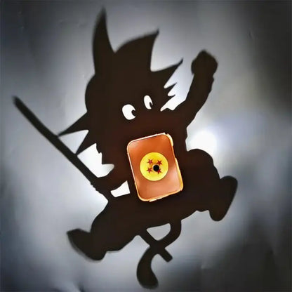 Orange phone case with yellow emblem and red stars featuring a black center hole for detective conan goku projector lamp night light
