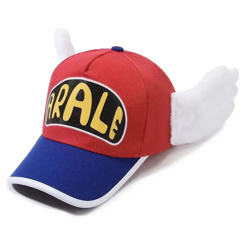 Red and blue baseball cap with white plush wing details and yellow arale logo front for dr slump fans