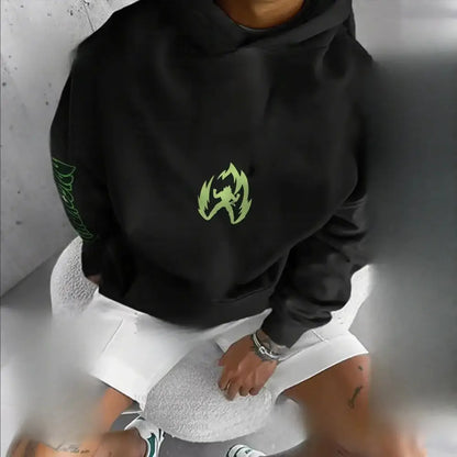Black oversized dragon ball broly hoodie with neon green flame graphic on chest and matching sleeve lettering