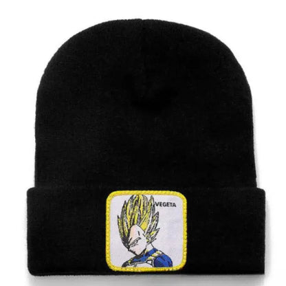 Black acrylic knit beanie featuring a yellow-trimmed embroidered knit patch of vegeta from dragon ball z