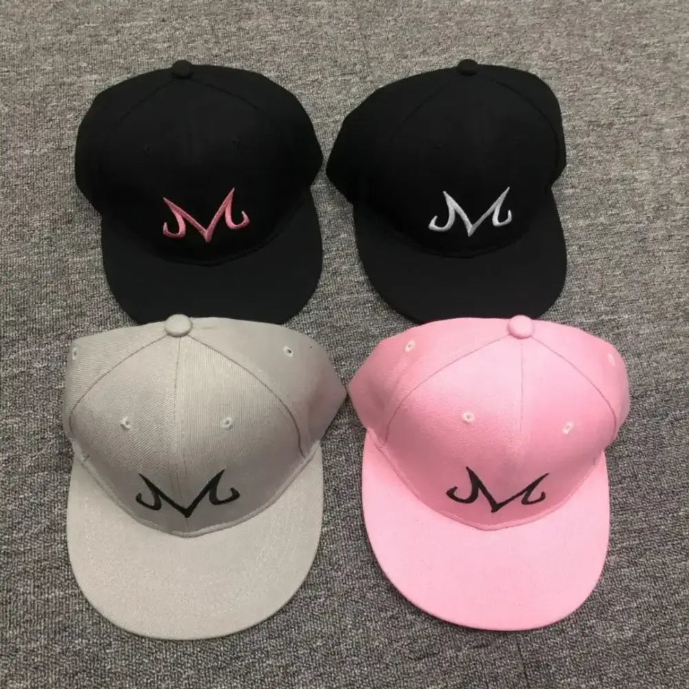 Four dragon ball buu snapback caps in black gray and pink with embroidered m logos made of cotton for hip hop style