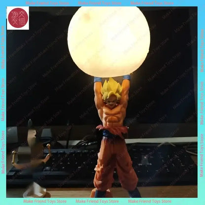 Dragon ball gogeta magnetic led lamp with glowing moon sphere held by detailed orange and blue goku figurine premium display
