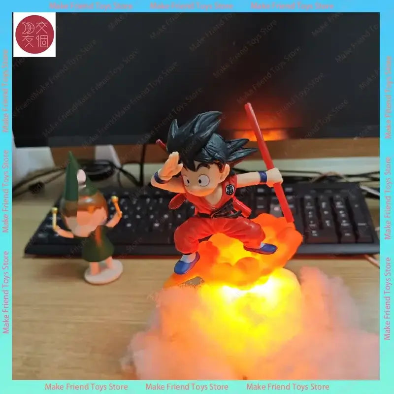 Dragon ball gogeta magnetic led lamp features a glowing orange flame base with a detailed red gi figurine for premium display