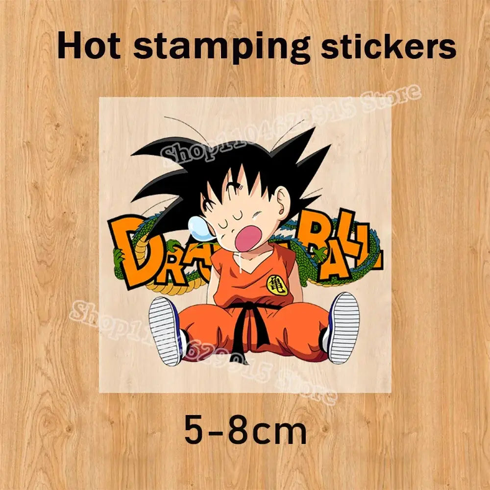 Orange and black dragon ball goku hot stamping sticker on a skin-friendly summer baby romper featuring goku in martial arts uniform