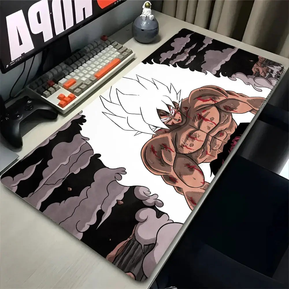 Black and white dragon ball goku gaming mouse pad with muscular character and red markings rubber desk mat