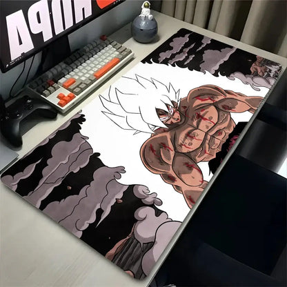Black and white dragon ball goku gaming mouse pad with muscular character and red markings rubber desk mat