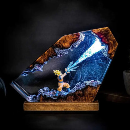 Dragon Ball Goku LED desk lamp with glowing blue energy beam in resin ocean waves base and magnetic base design