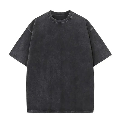 Black oversized cotton t-shirt with relaxed fit and faded texture featuring dragon ball goku vintage washed design