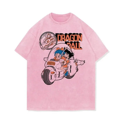 Pink oversized vintage washed t-shirt featuring dragon ball goku and bulma on spaceship graphic design