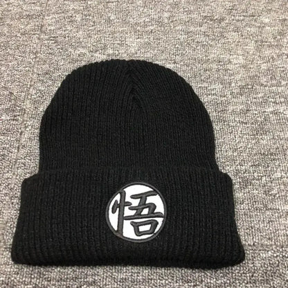 Black knitted winter beanie with white patch featuring black dragon ball embroidery of japanese character悟