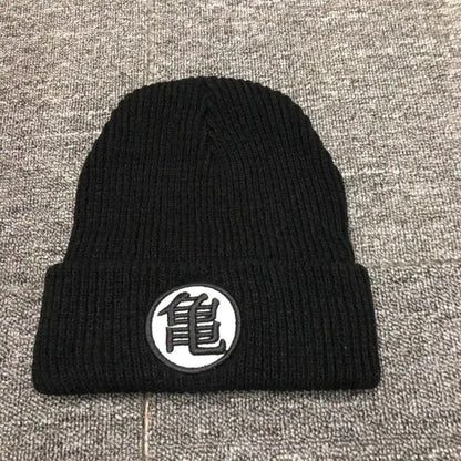 Black knitted dragon ball logo cuffed beanie with white patch featuring black kanji dragon ball embroidery