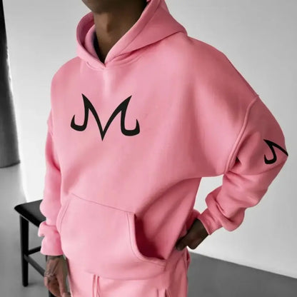 Pink dragon ball majin buu long sleeve hoodie with black stylized m logo on chest and matching sleeve design