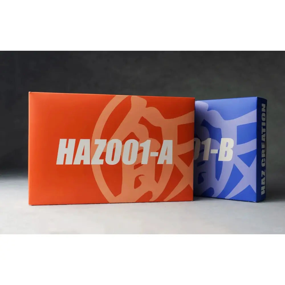 Orange and blue rectangular boxes labeled haz001-a and haz001-b for dragon ball armed son gohan figure shf style