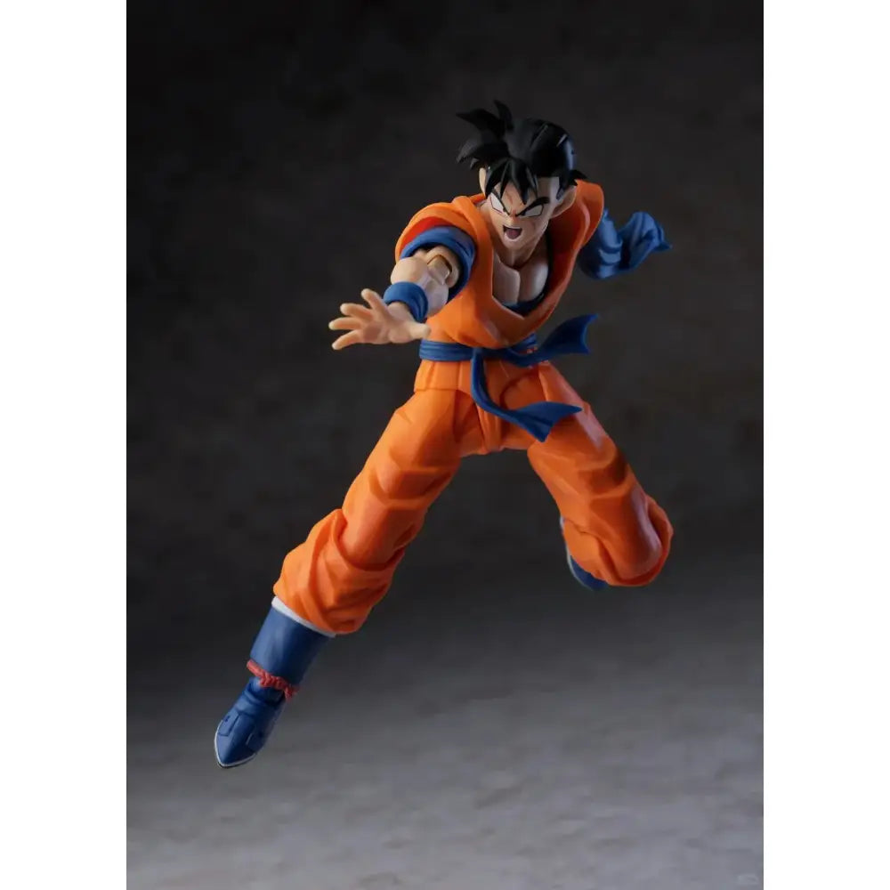 Orange and blue dragon ball son gohan action figure in dynamic pose from dragon ball one armed son gohan shf style
