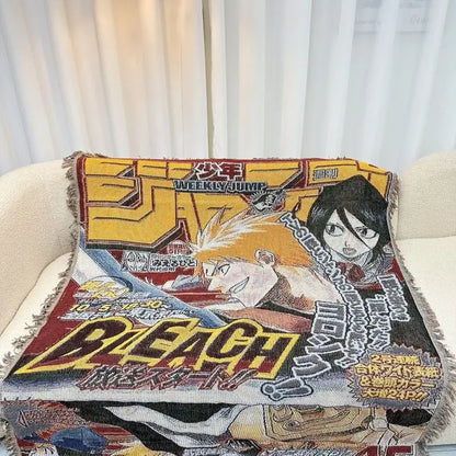A vibrant textile blanket made of cotton thread featuring a dragon ball inspired bleach manga cover design in yellow and red